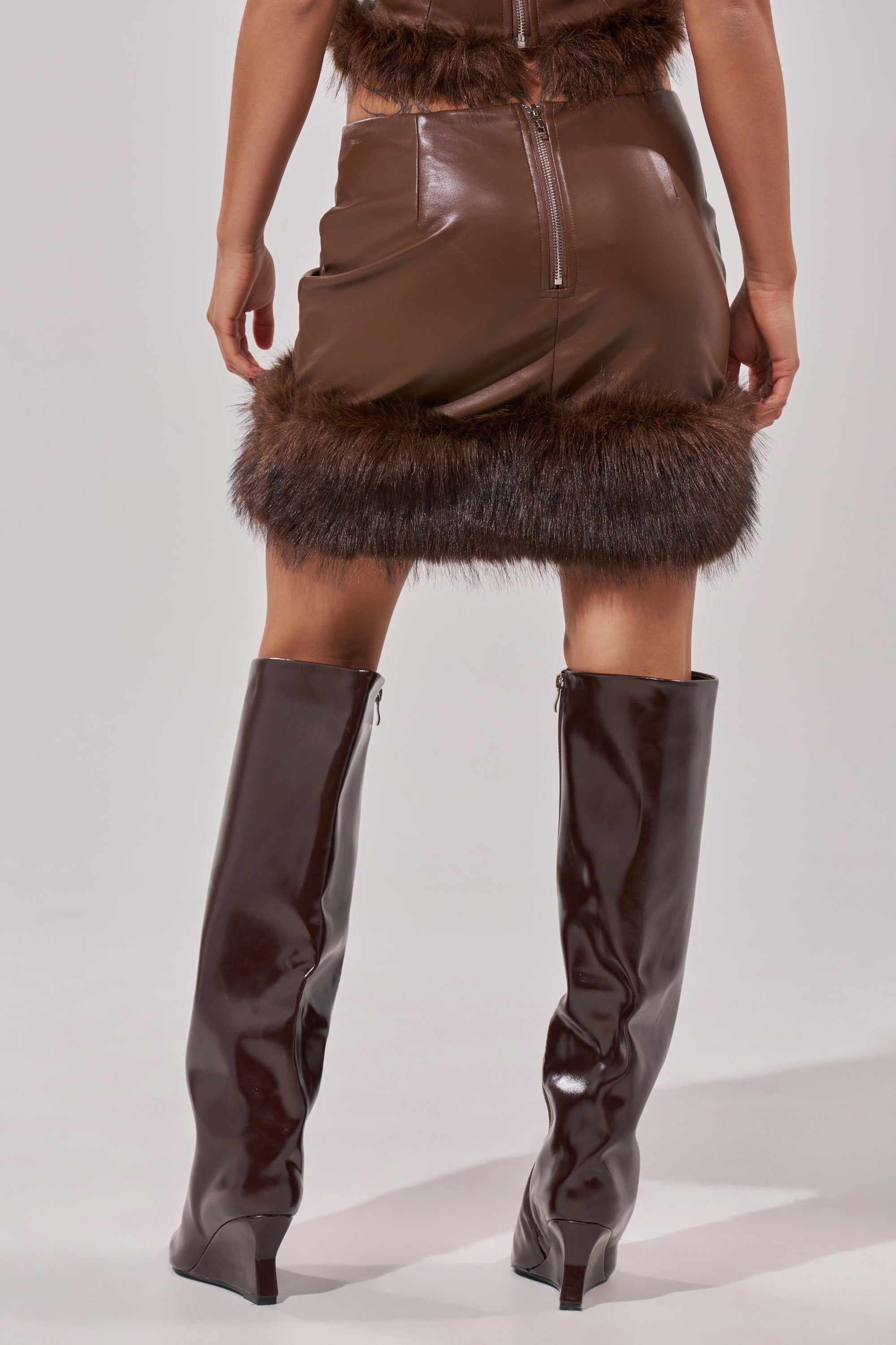 CANT MISS ME FAUX LEATHER MINI SKIRT